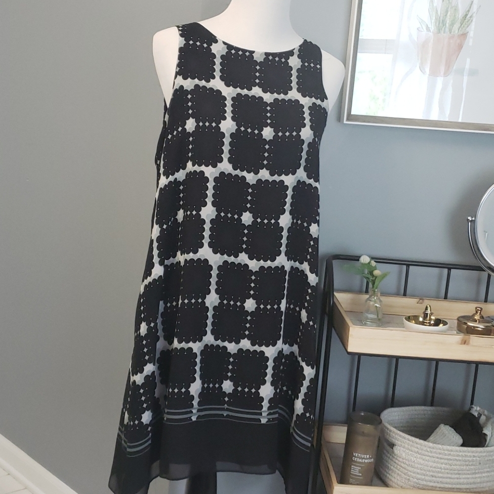 36.5" length, sleeveless dress with liner
